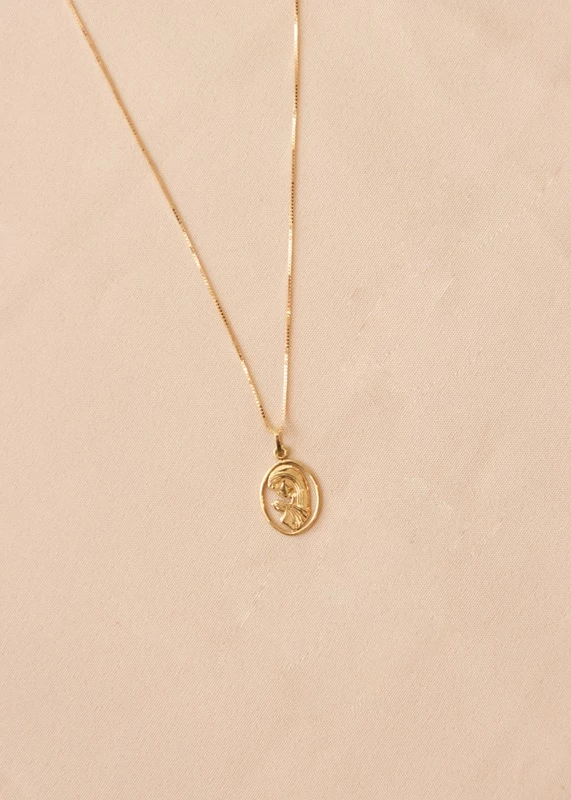 medalla-de-oro-virgen-nina