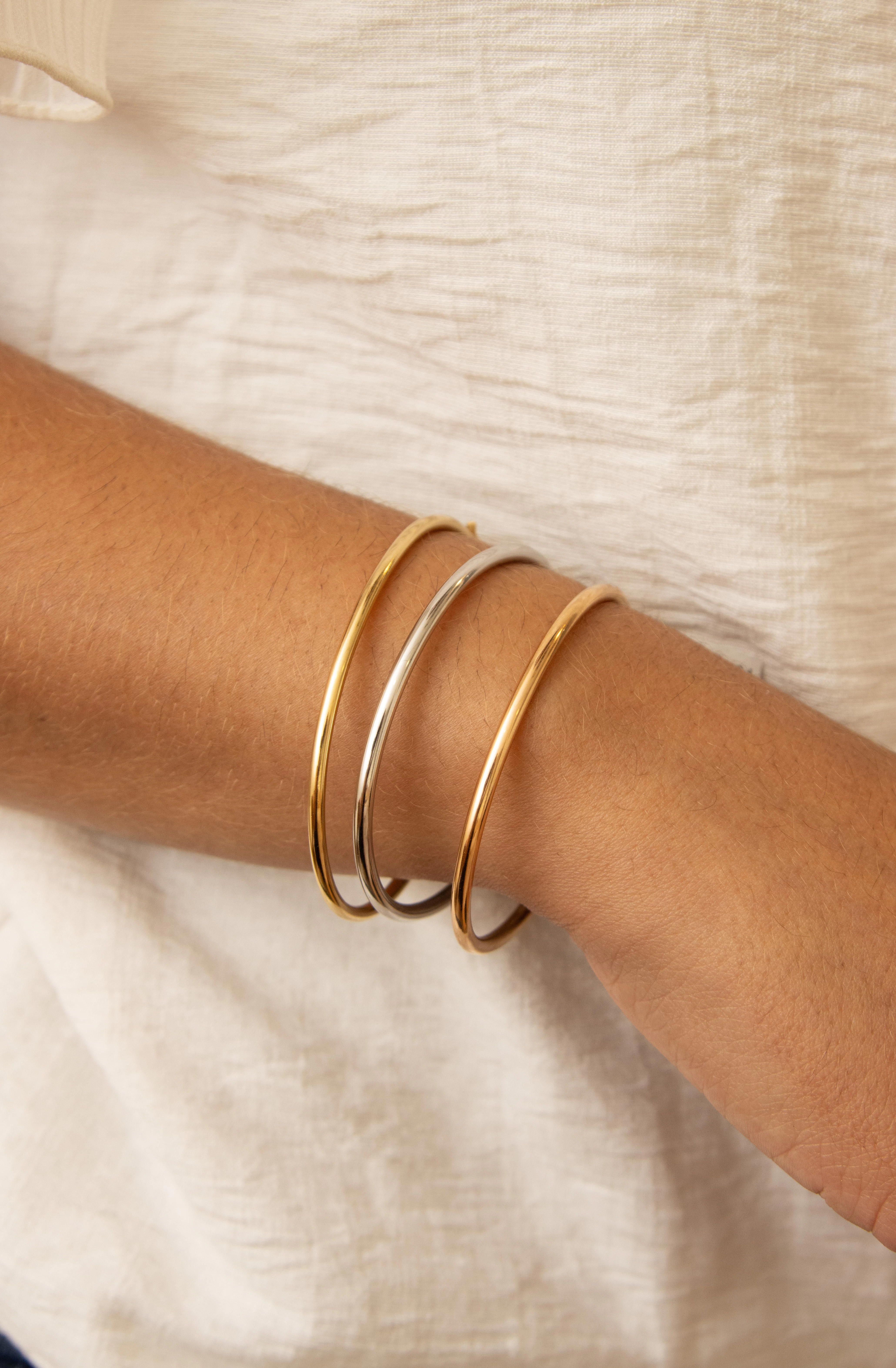 pulseras-de-tres-tonos-de-oro